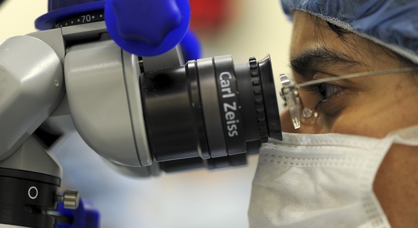 Doctor using a medical scope