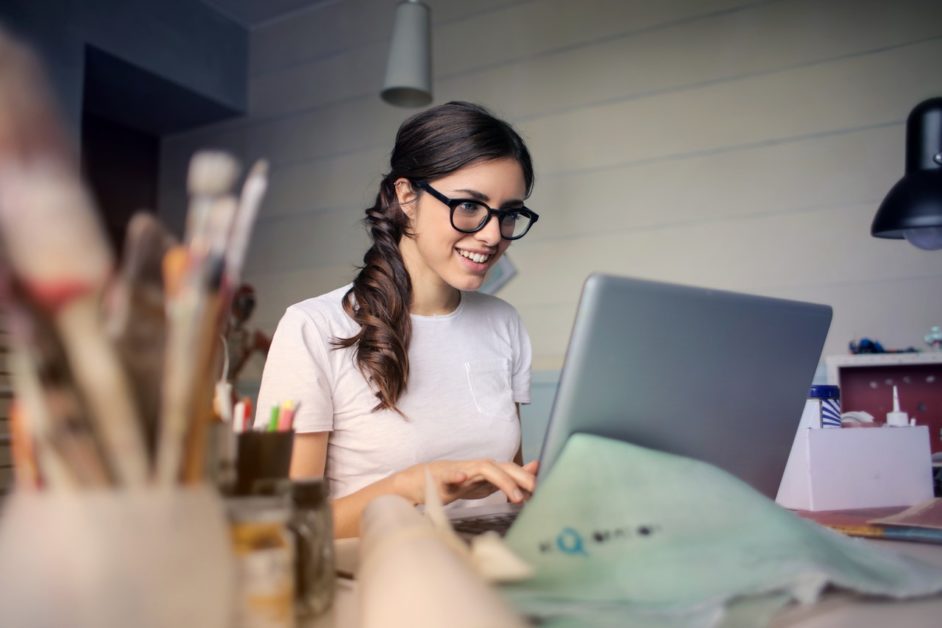 a woman working on her laptop